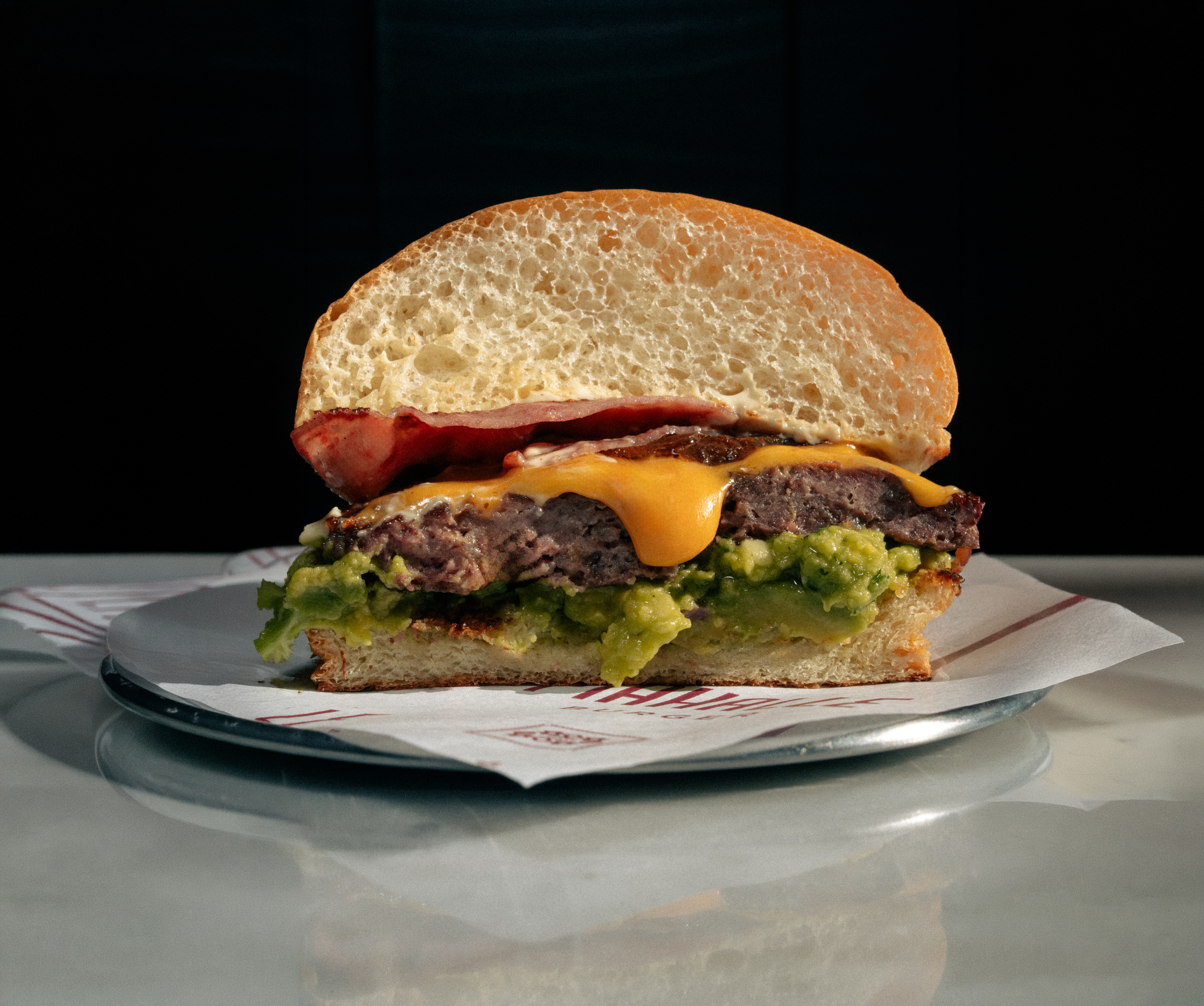 Avo-Kado burger with avocado salsa and smoked beef rib